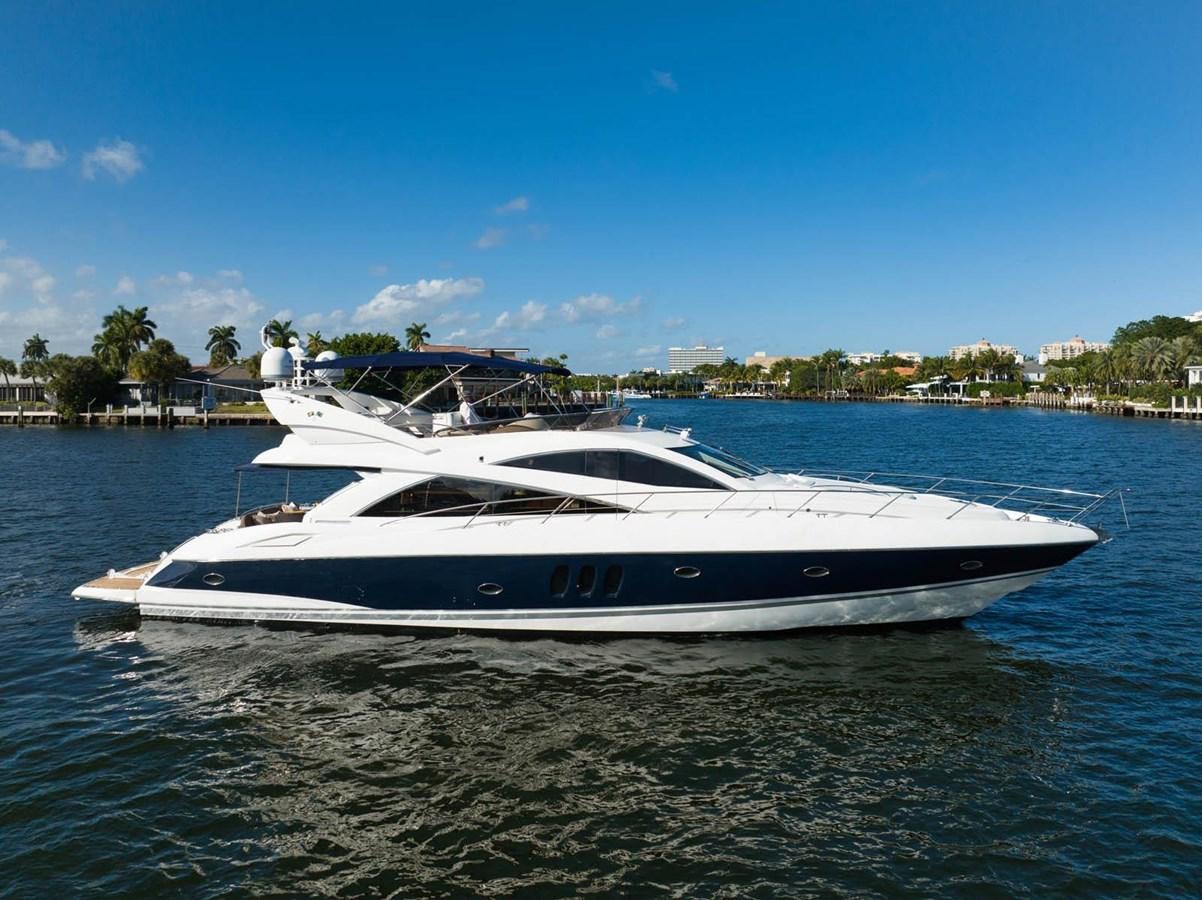a white yacht on the water aboard UNFORGETTABLE Yacht for Sale