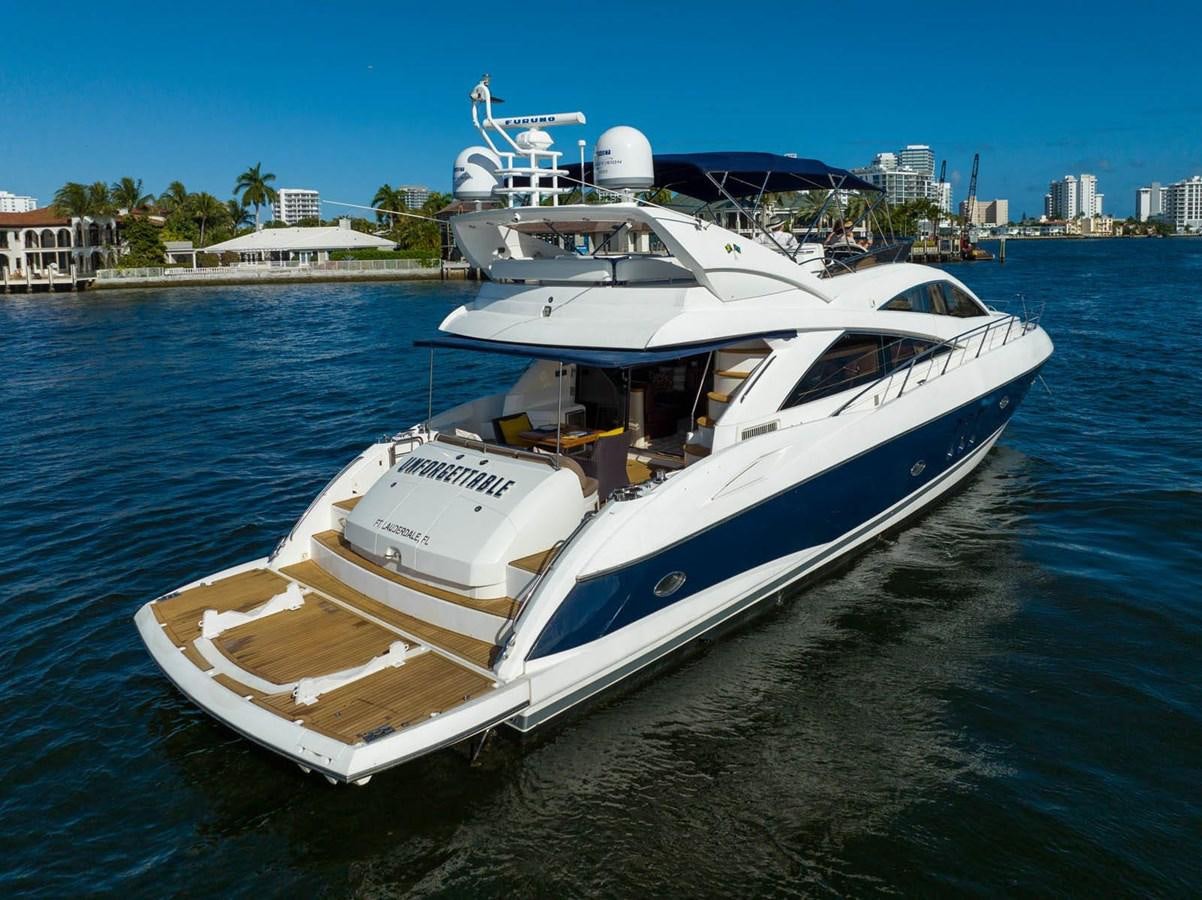 a white yacht on the water aboard UNFORGETTABLE Yacht for Sale