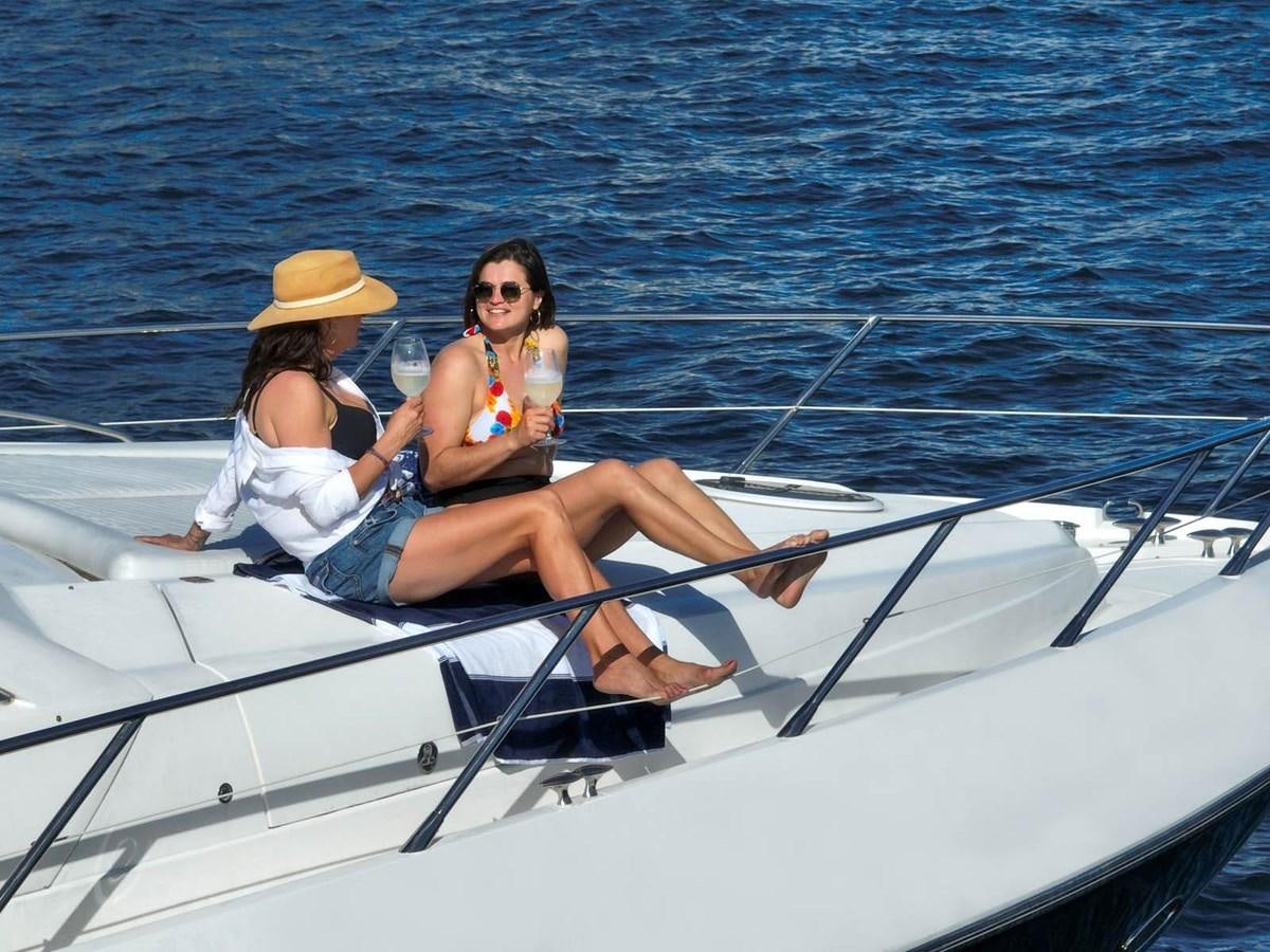 a group of women on a boat aboard UNFORGETTABLE Yacht for Sale