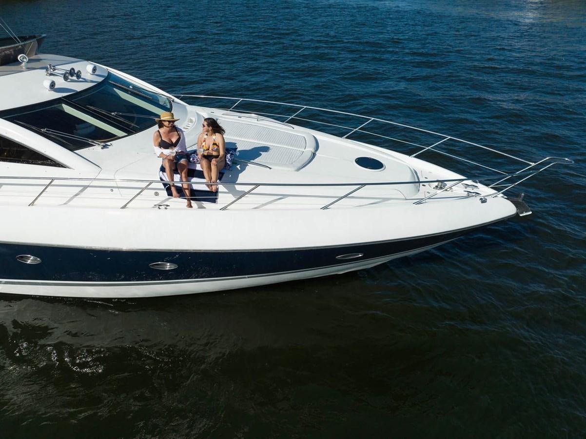 a group of people on a boat aboard UNFORGETTABLE Yacht for Sale