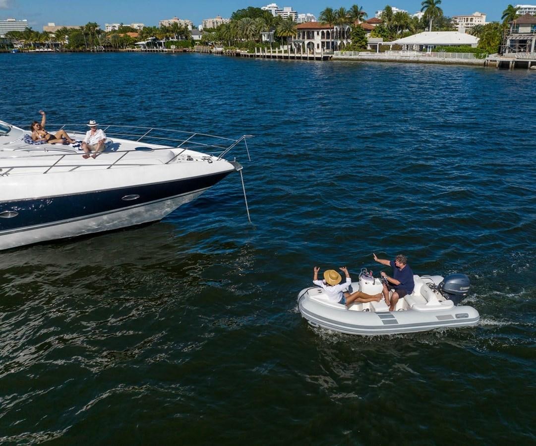 a group of people on a boat aboard UNFORGETTABLE Yacht for Sale