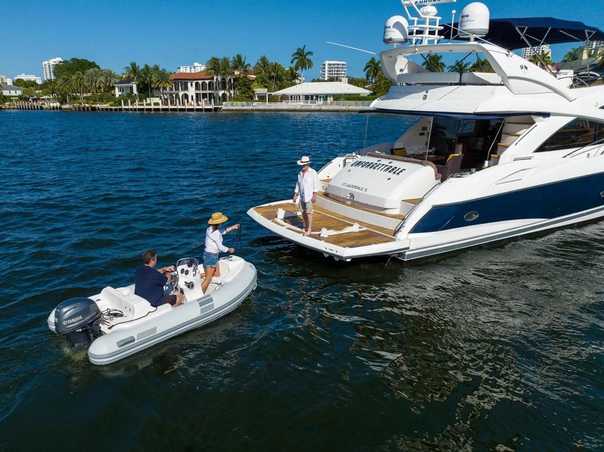 a group of people on a boat aboard UNFORGETTABLE Yacht for Sale
