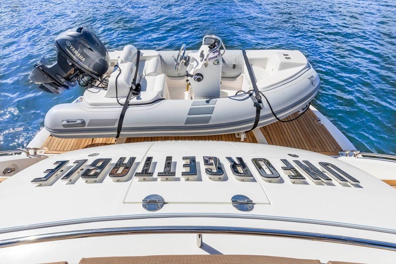 a boat with a helmet on it aboard UNFORGETTABLE Yacht for Sale