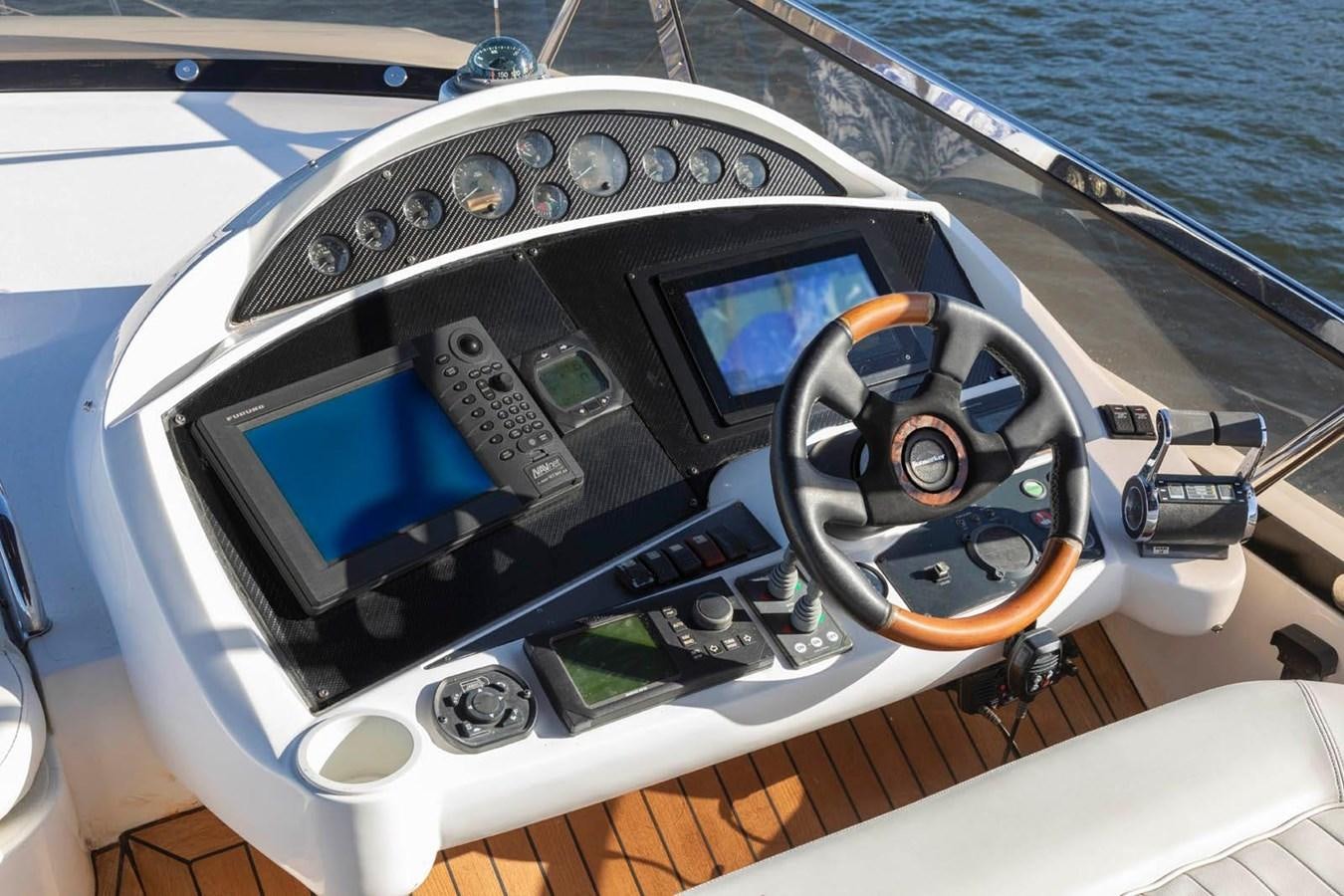 the inside of a cockpit of a plane aboard UNFORGETTABLE Yacht for Sale