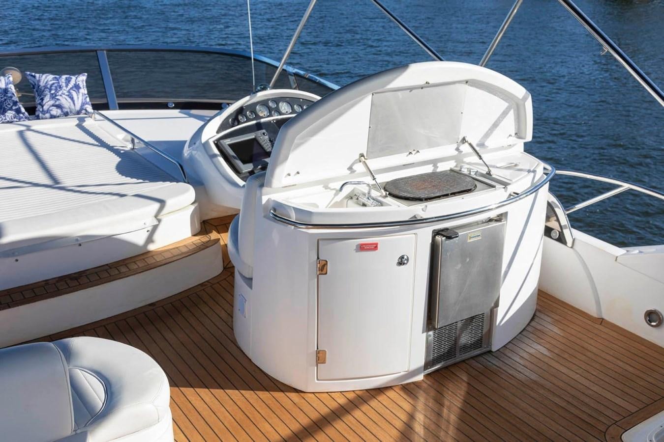 a white and black boat aboard UNFORGETTABLE Yacht for Sale