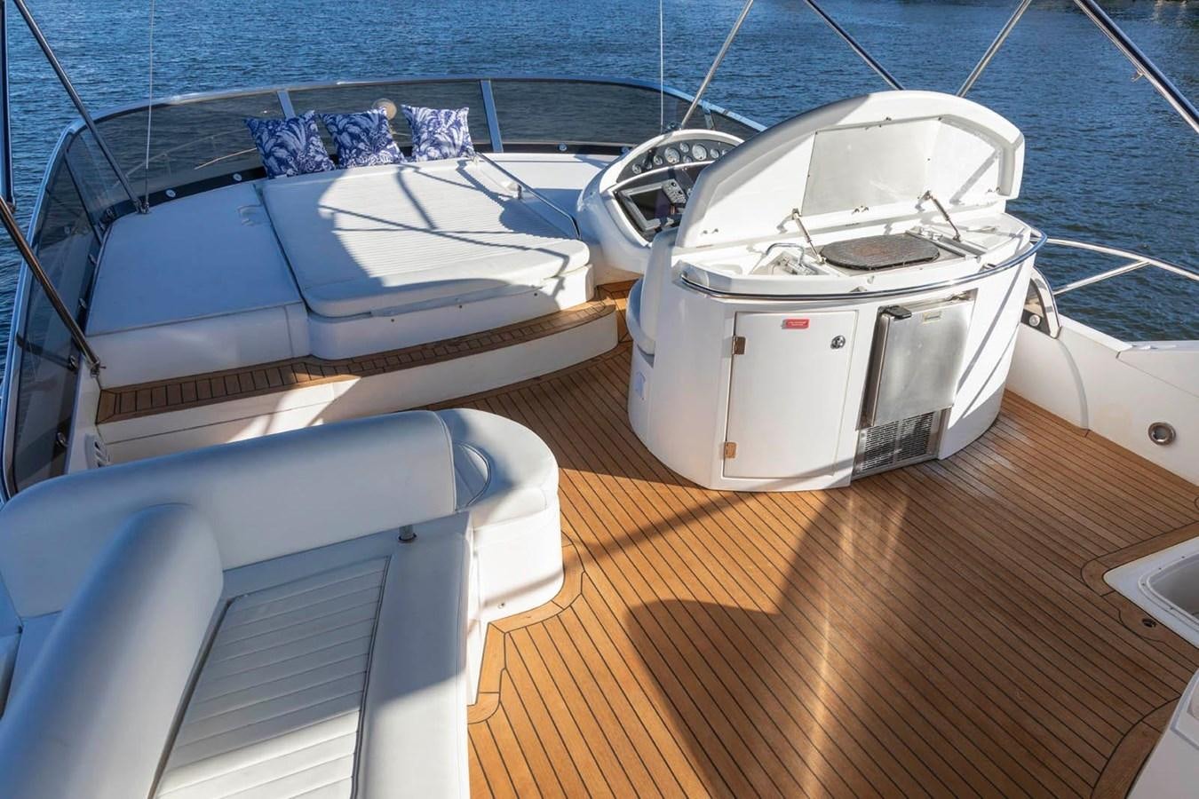 a boat on a deck aboard UNFORGETTABLE Yacht for Sale