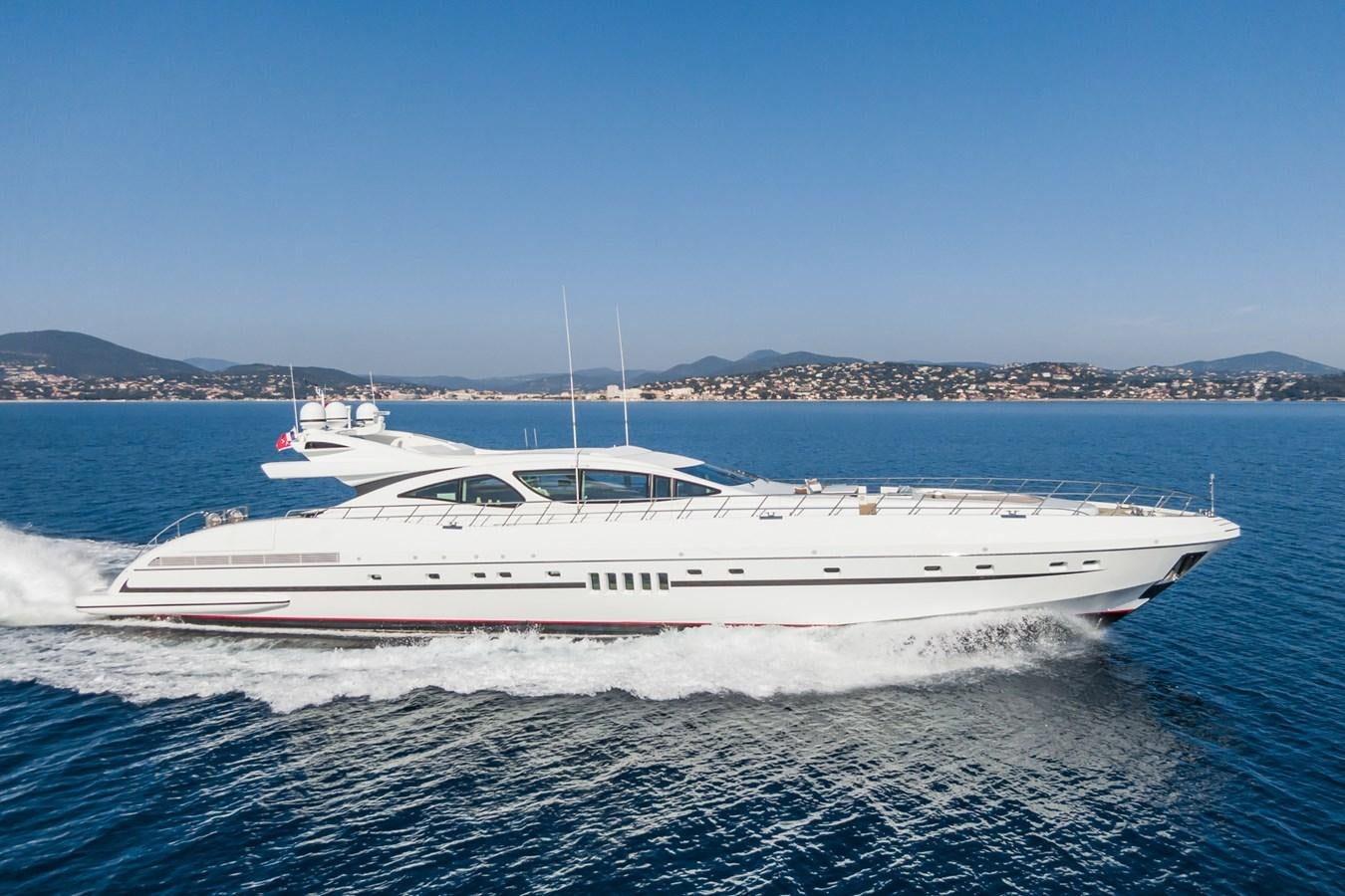 a white yacht on the water aboard MANGUSTA 130 Yacht for Sale