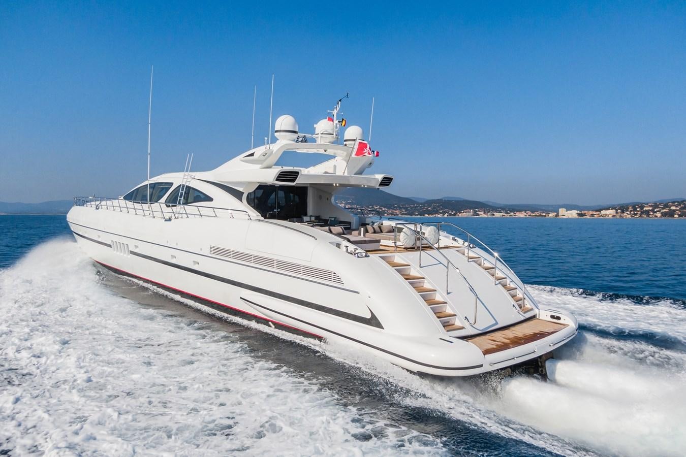 a white yacht on the water aboard MANGUSTA 130 Yacht for Sale
