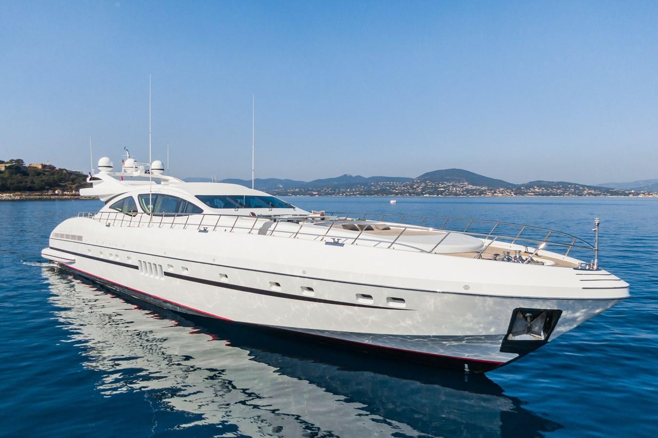 a white yacht on the water aboard MANGUSTA 130 Yacht for Sale