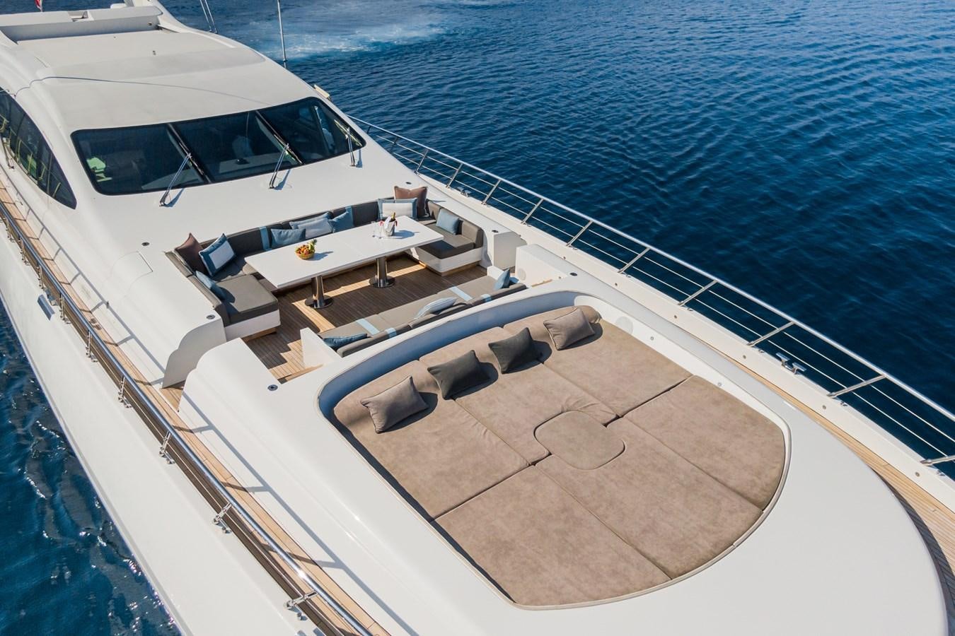a boat on the water aboard MANGUSTA 130 Yacht for Sale