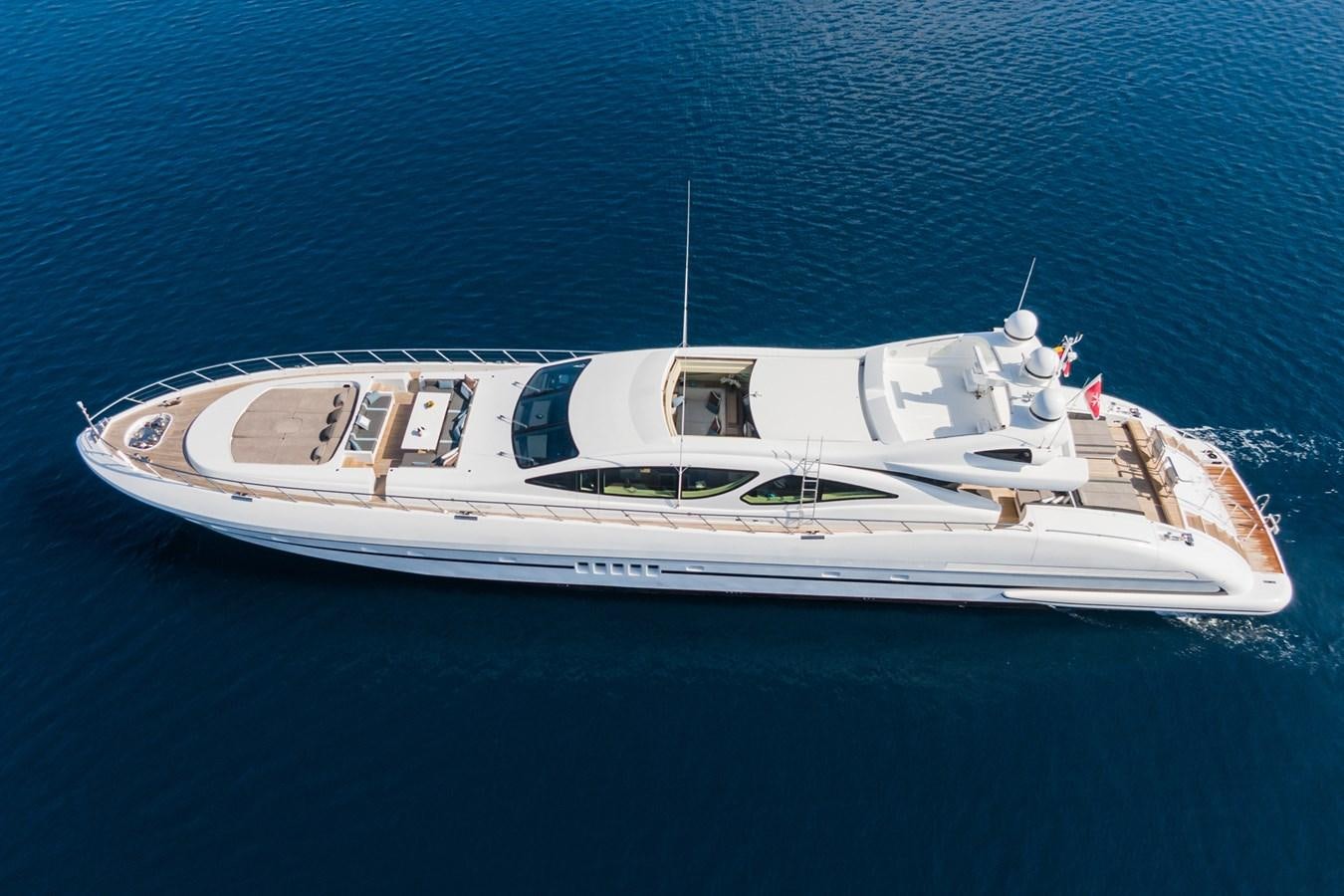 a white boat in the water aboard MANGUSTA 130 Yacht for Sale