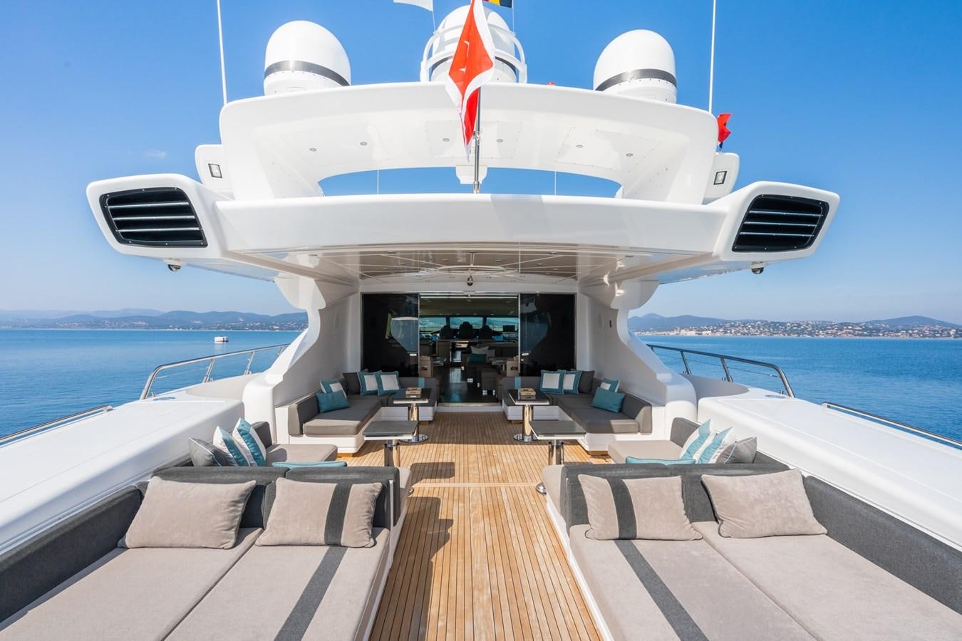 a boat on a dock aboard MANGUSTA 130 Yacht for Sale