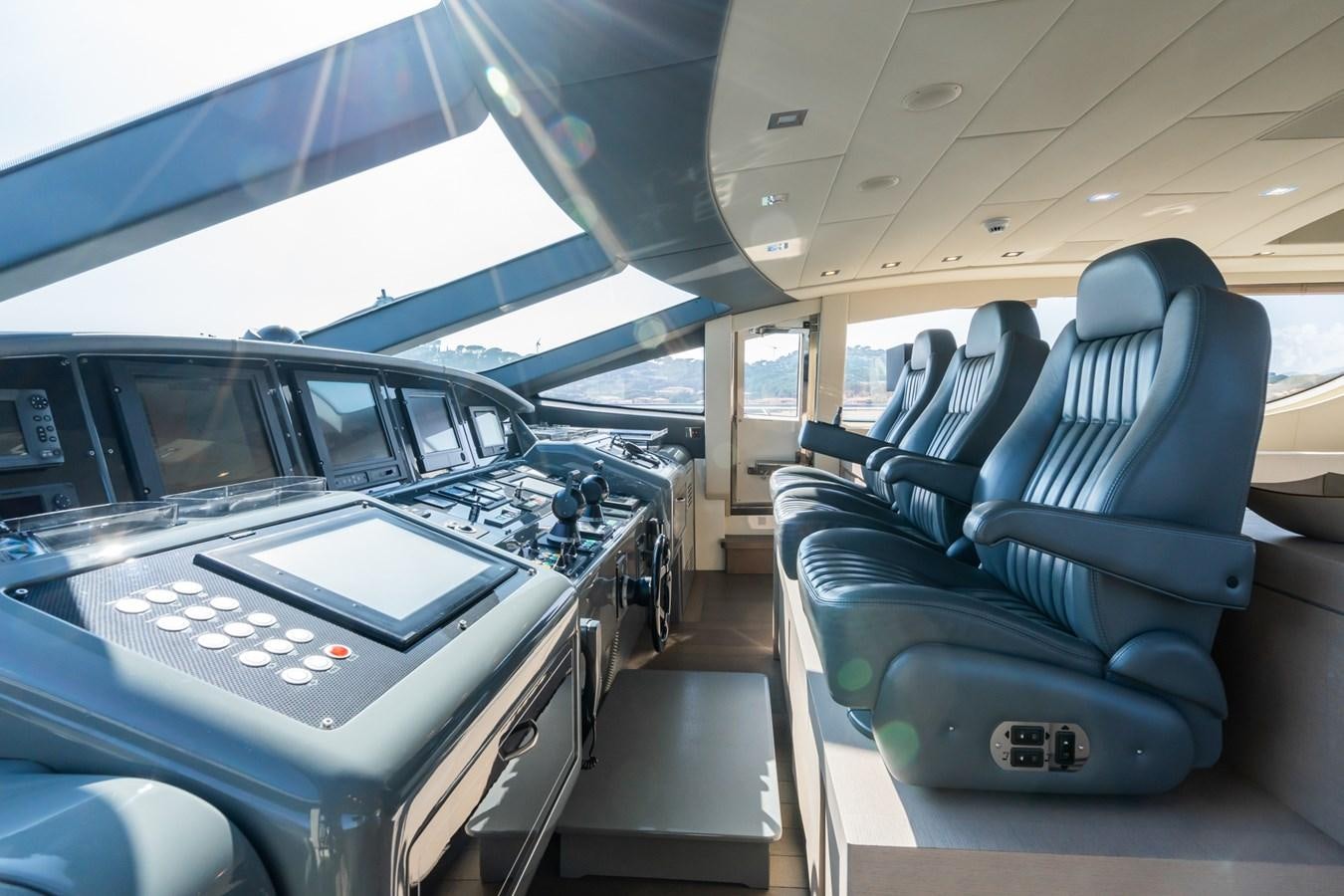 inside of a vehicle with many seats aboard MANGUSTA 130 Yacht for Sale