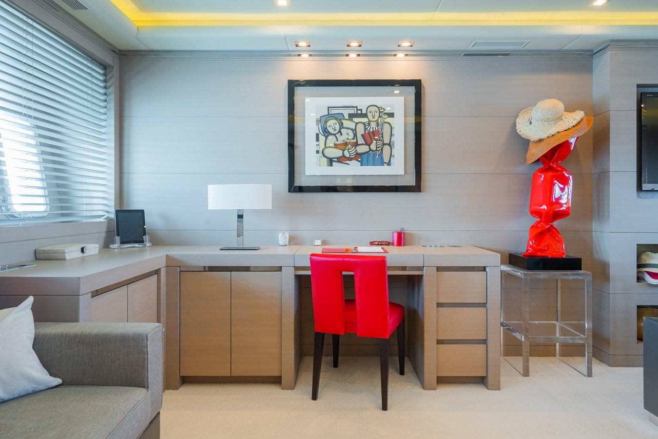 a room with a desk and a chair and a television aboard MANGUSTA 130 Yacht for Sale