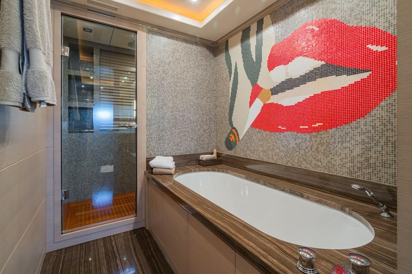 a bathroom with a large shower aboard MANGUSTA 130 Yacht for Sale