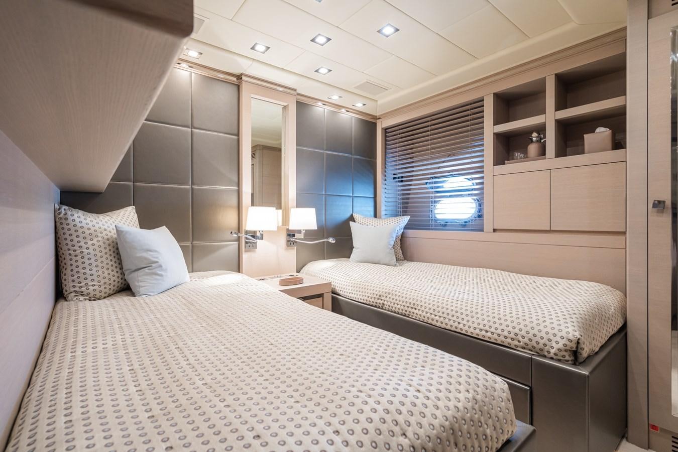 a couple of beds in a hotel room aboard MANGUSTA 130 Yacht for Sale