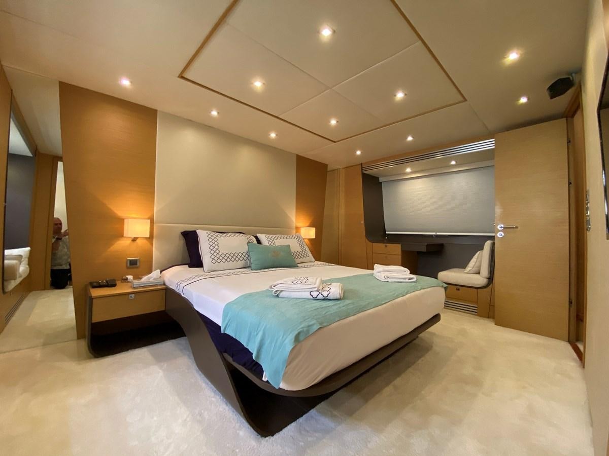 a bed in a hotel room aboard MR CORN Yacht for Sale