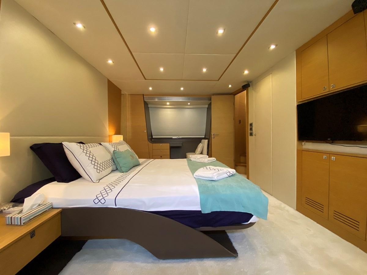 a hotel room with a bed aboard MR CORN Yacht for Sale