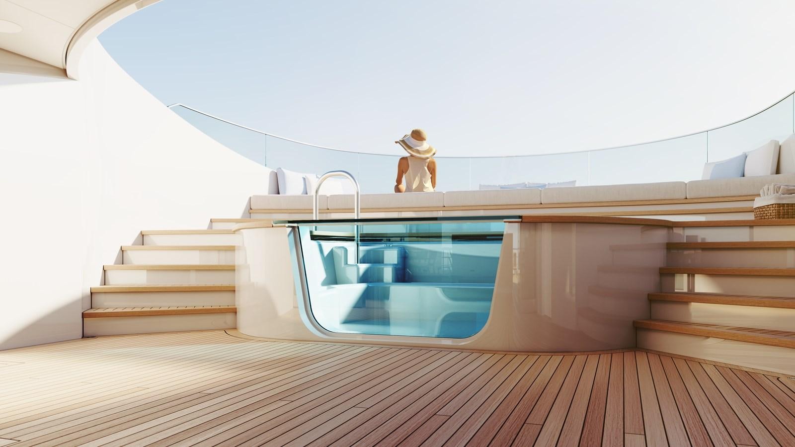 a glass shower with a person standing on the edge of a white bathtub aboard SAKURA Yacht for Sale