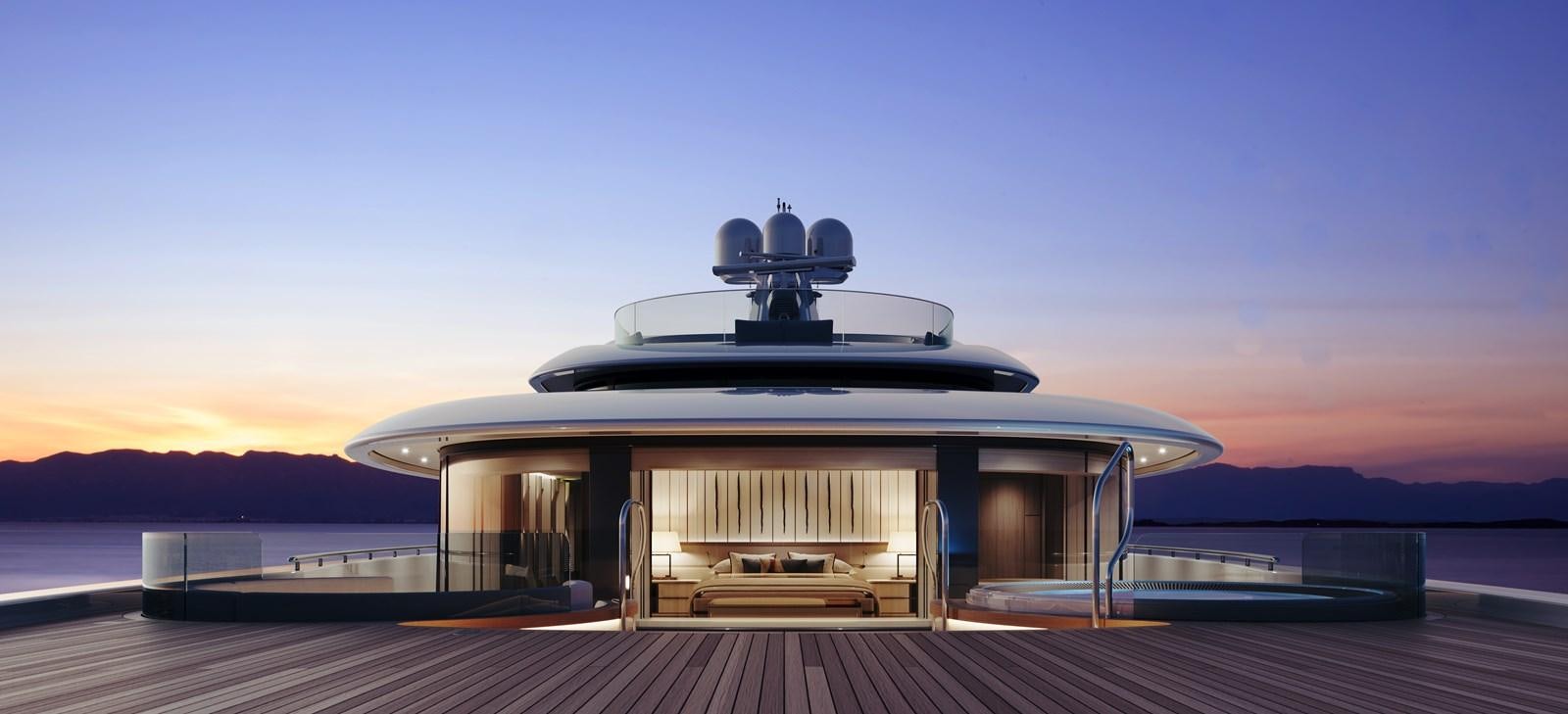 a large white building with a large deck and a body of water in the background aboard SAKURA Yacht for Sale