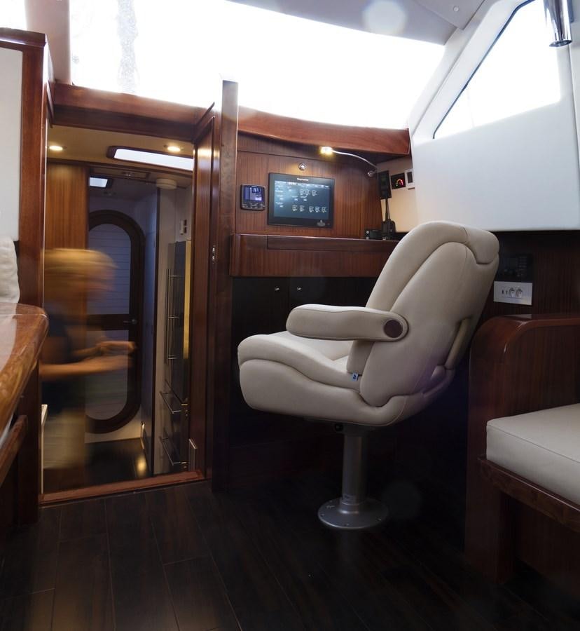 a chair in a train aboard LADY FLORE Yacht for Sale