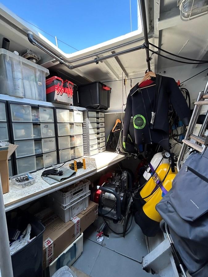 a car with shelves and items in it aboard LADY FLORE Yacht for Sale