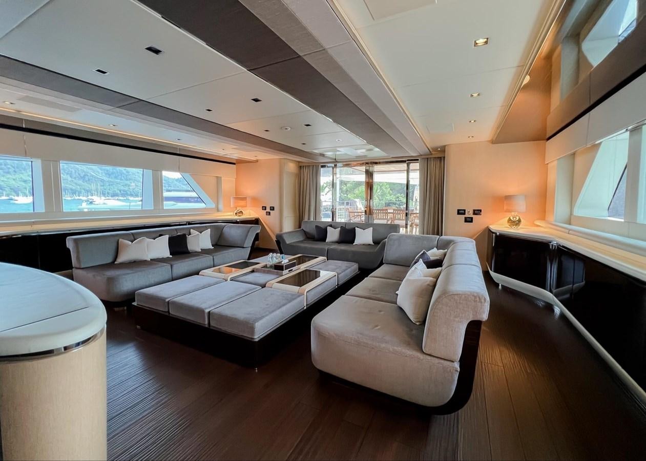 a living room with a couch and a table aboard SUNNY Yacht for Sale