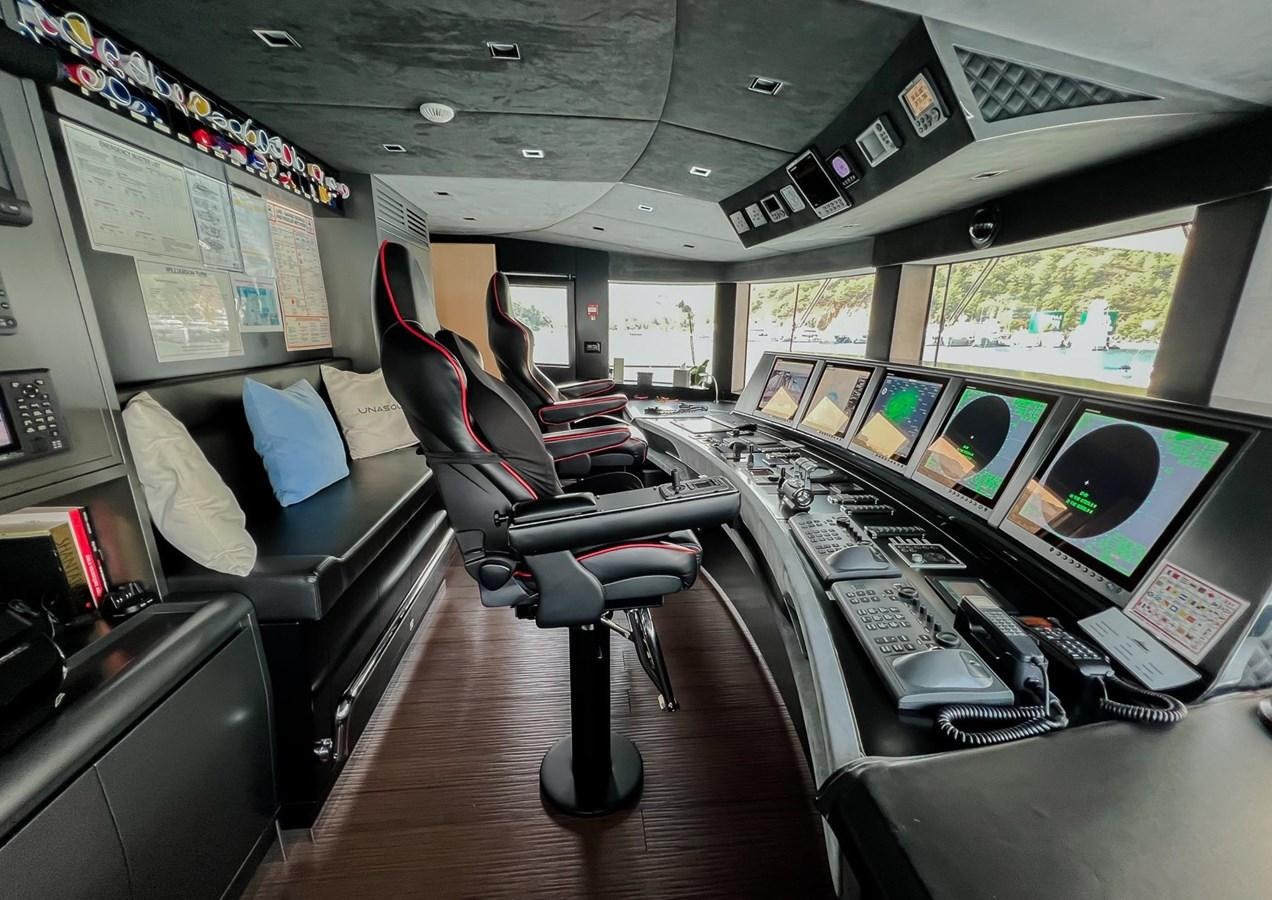 a room with a desk and chairs aboard SUNNY Yacht for Sale