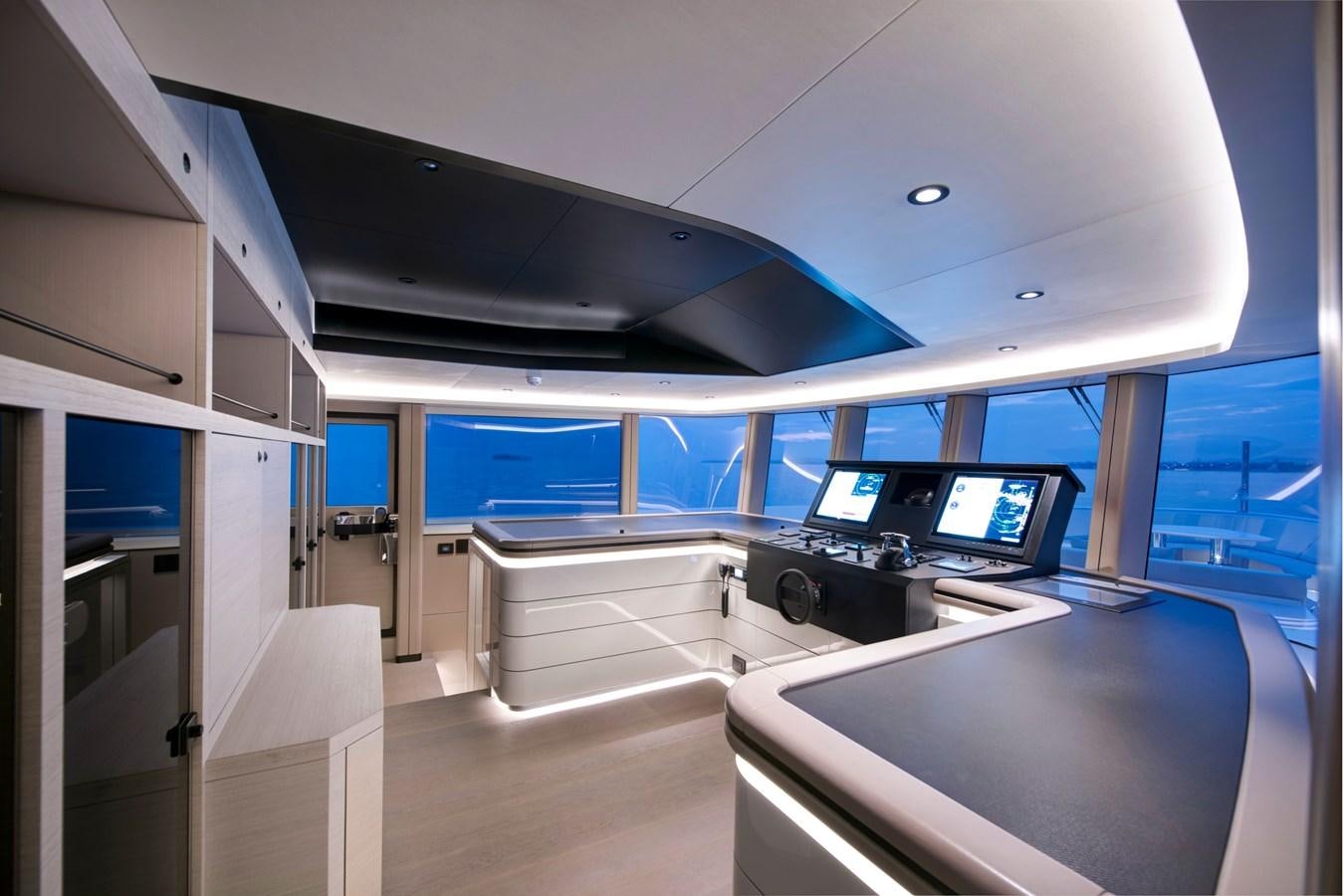 inside of a building with computers aboard PICCOLO @ FLIBS Yacht for Sale