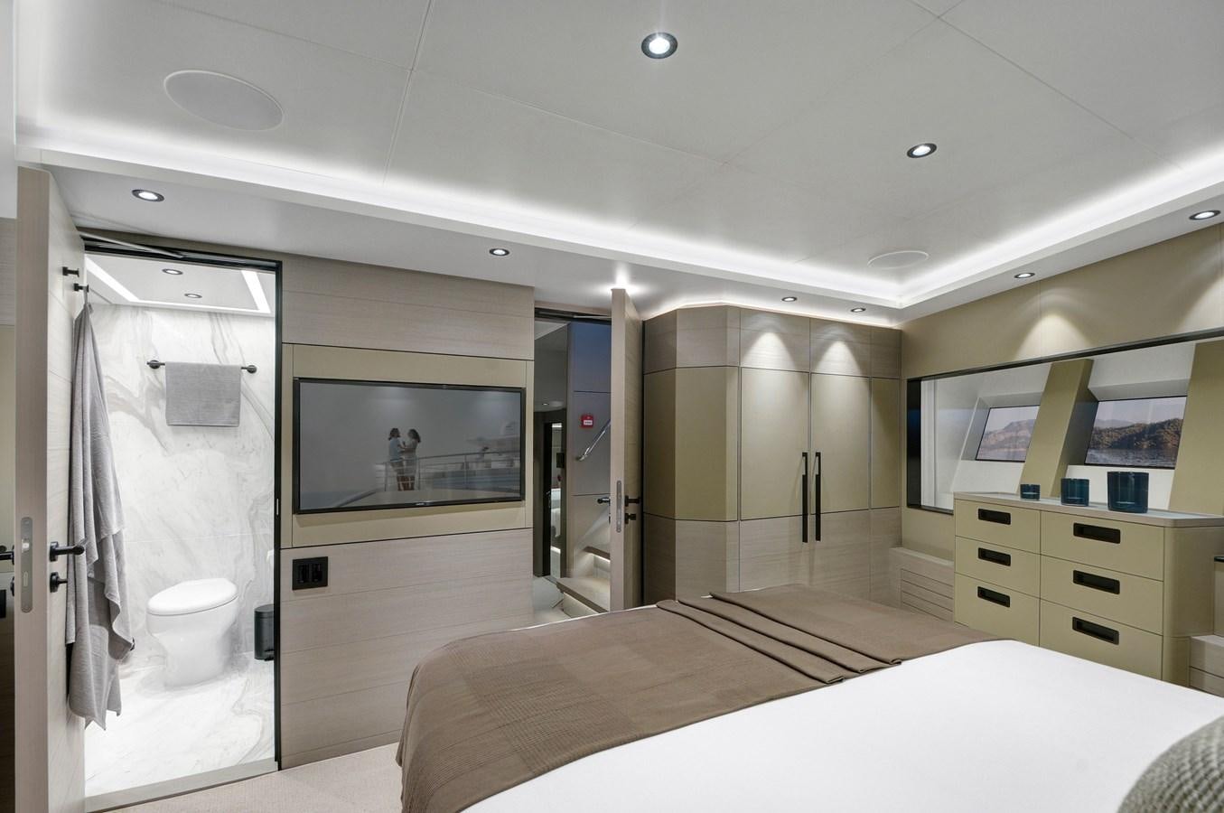 a bathroom with a large mirror aboard PICCOLO @ FLIBS Yacht for Sale