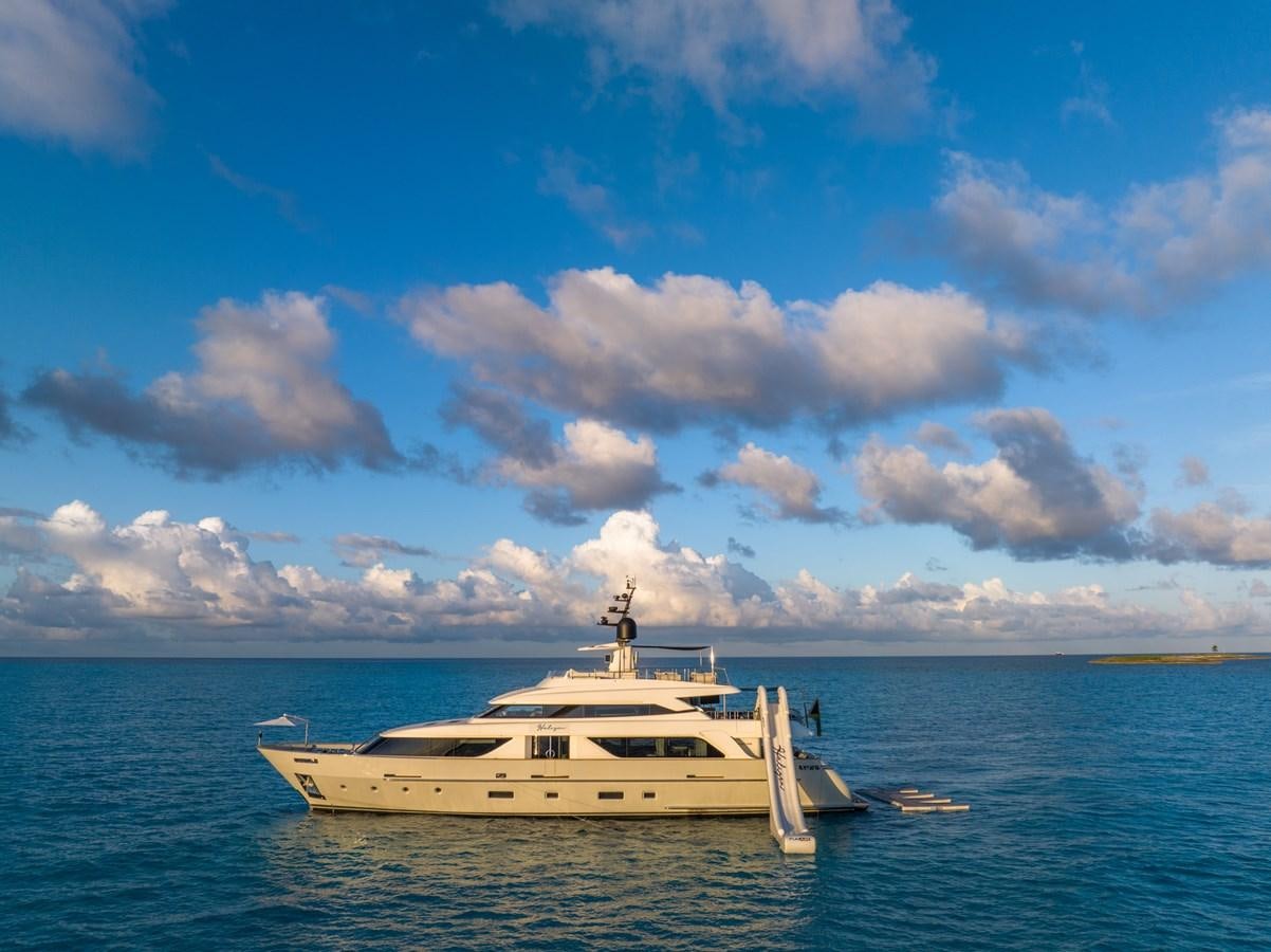 a white boat in the water aboard HALCYON Yacht for Sale