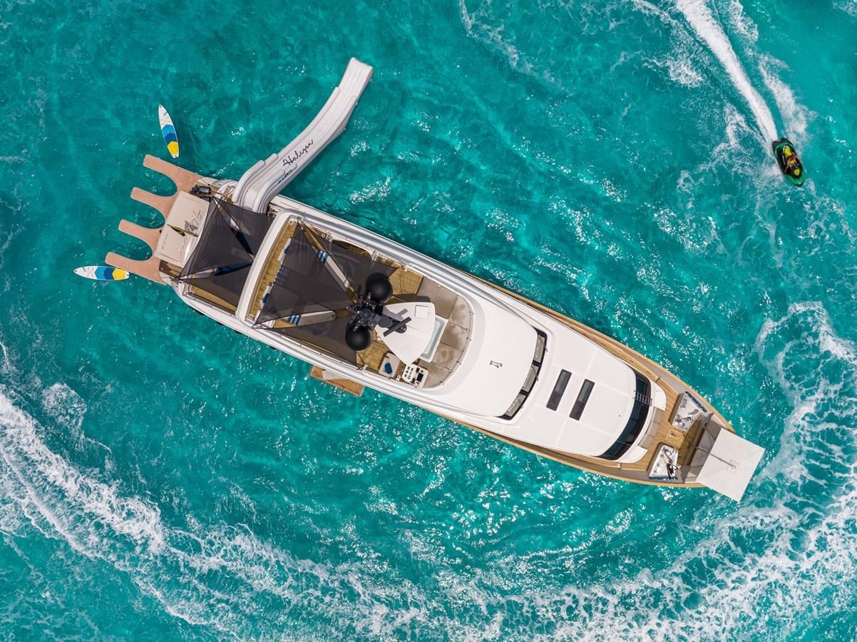 a plane flying over the ocean aboard HALCYON Yacht for Sale