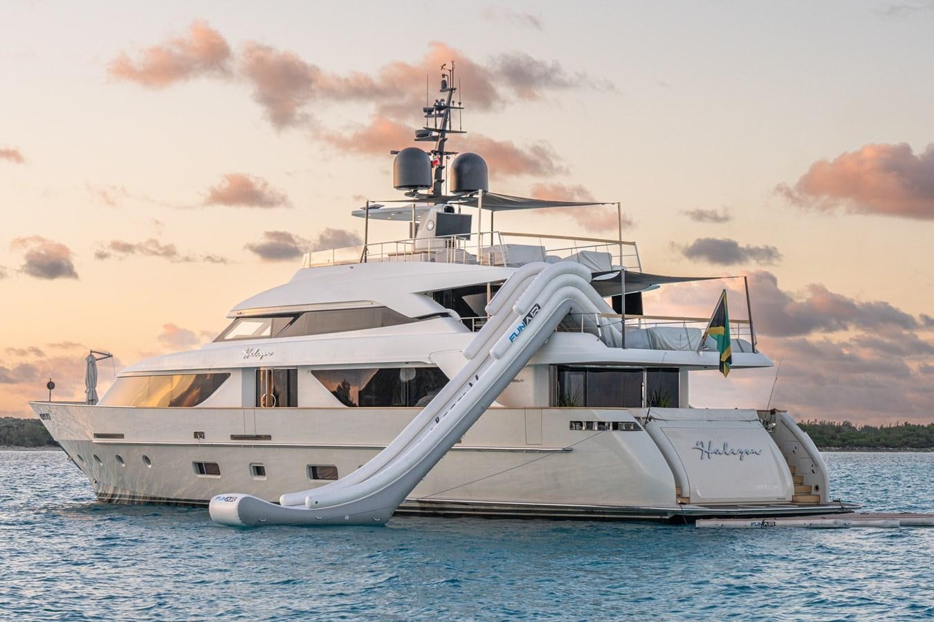 a white boat in the water aboard HALCYON Yacht for Sale