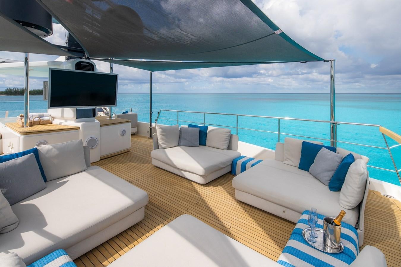 a large living room with a large balcony aboard HALCYON Yacht for Sale