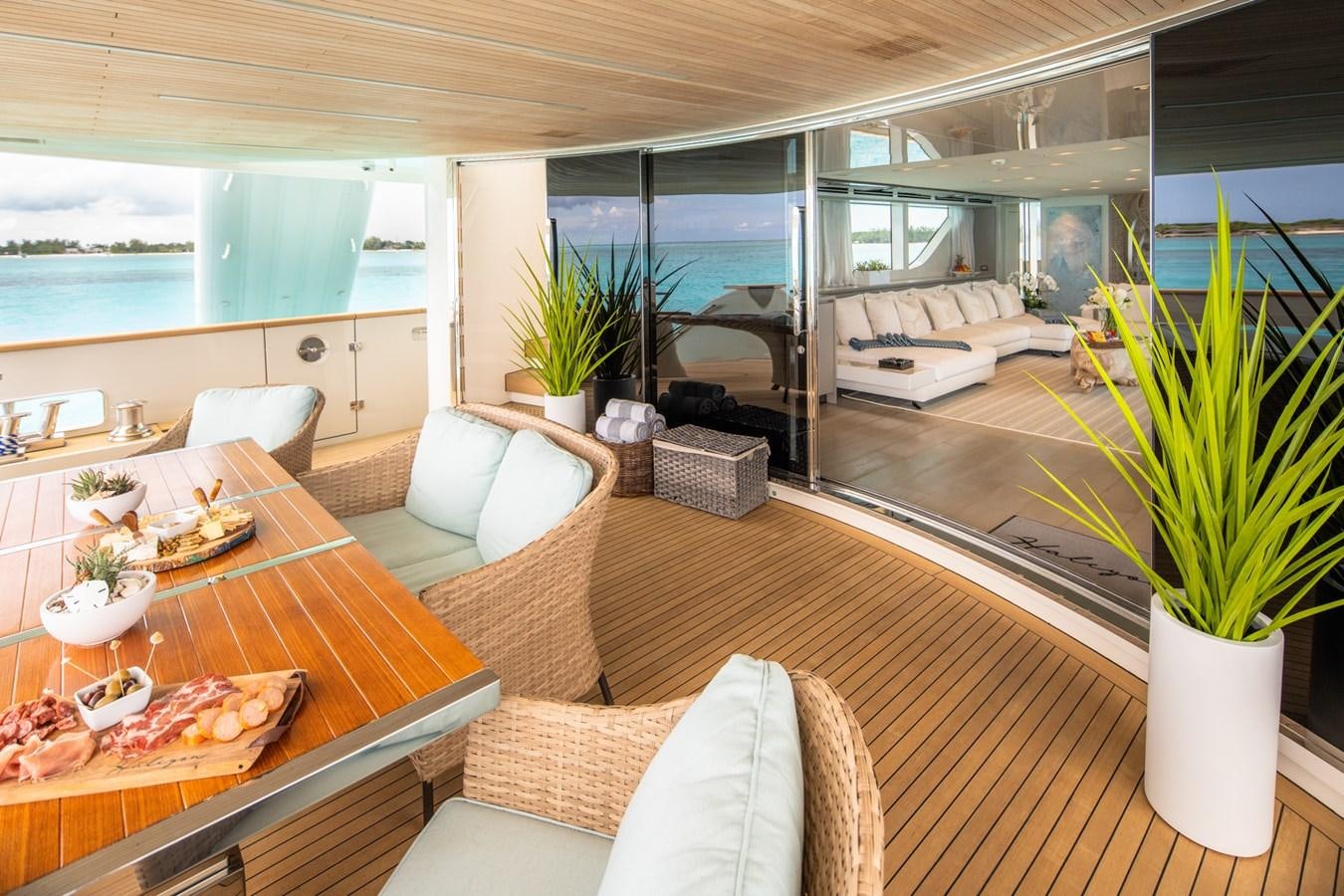 a living room with a large window aboard HALCYON Yacht for Sale
