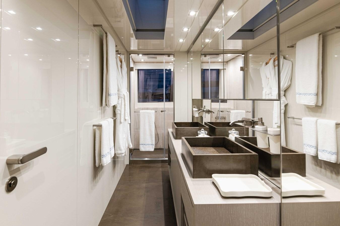 a bathroom with a sink and a mirror aboard HALCYON Yacht for Sale