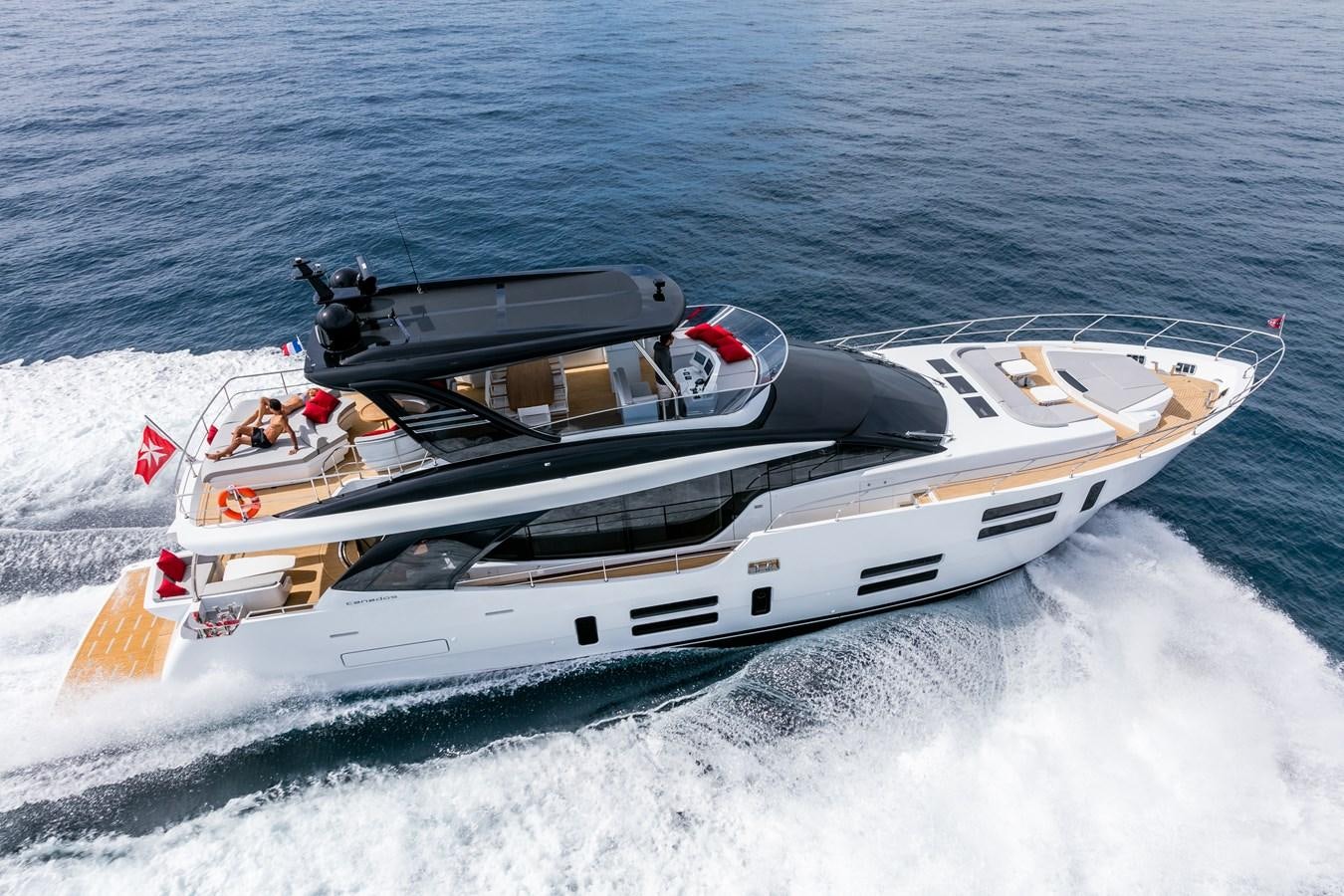 a boat on the water aboard 2025 CANADOS 808’ MAXIMUS Yacht for Sale
