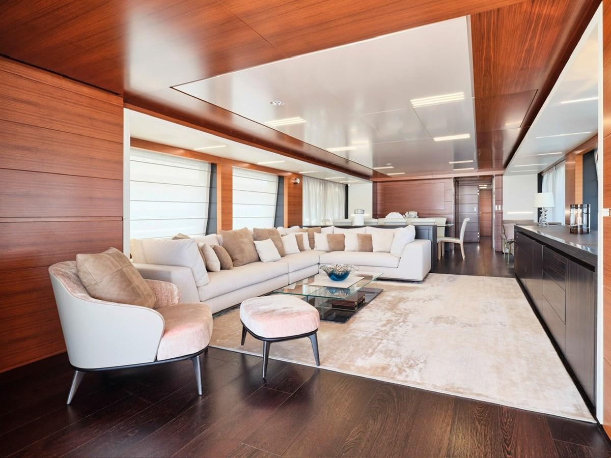 a living room with a couch and a table aboard "THIRTY SEVEN Yacht for Sale