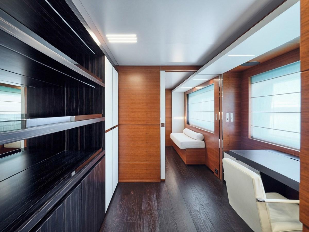 a room with a bed and a chair aboard "THIRTY SEVEN Yacht for Sale