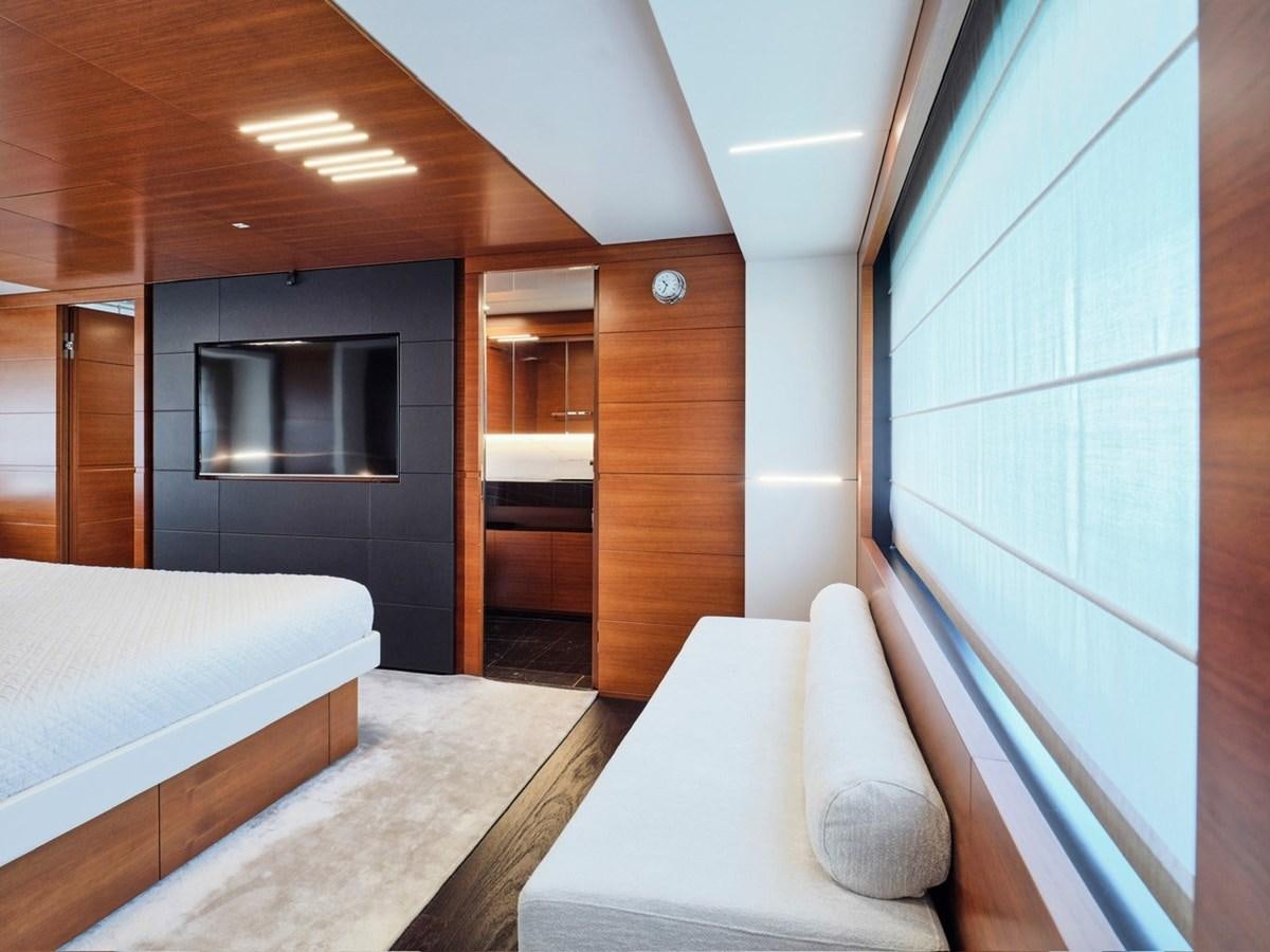 a room with a bed and a television aboard "THIRTY SEVEN Yacht for Sale