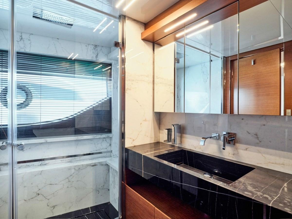 a bathroom with a large window aboard "THIRTY SEVEN Yacht for Sale