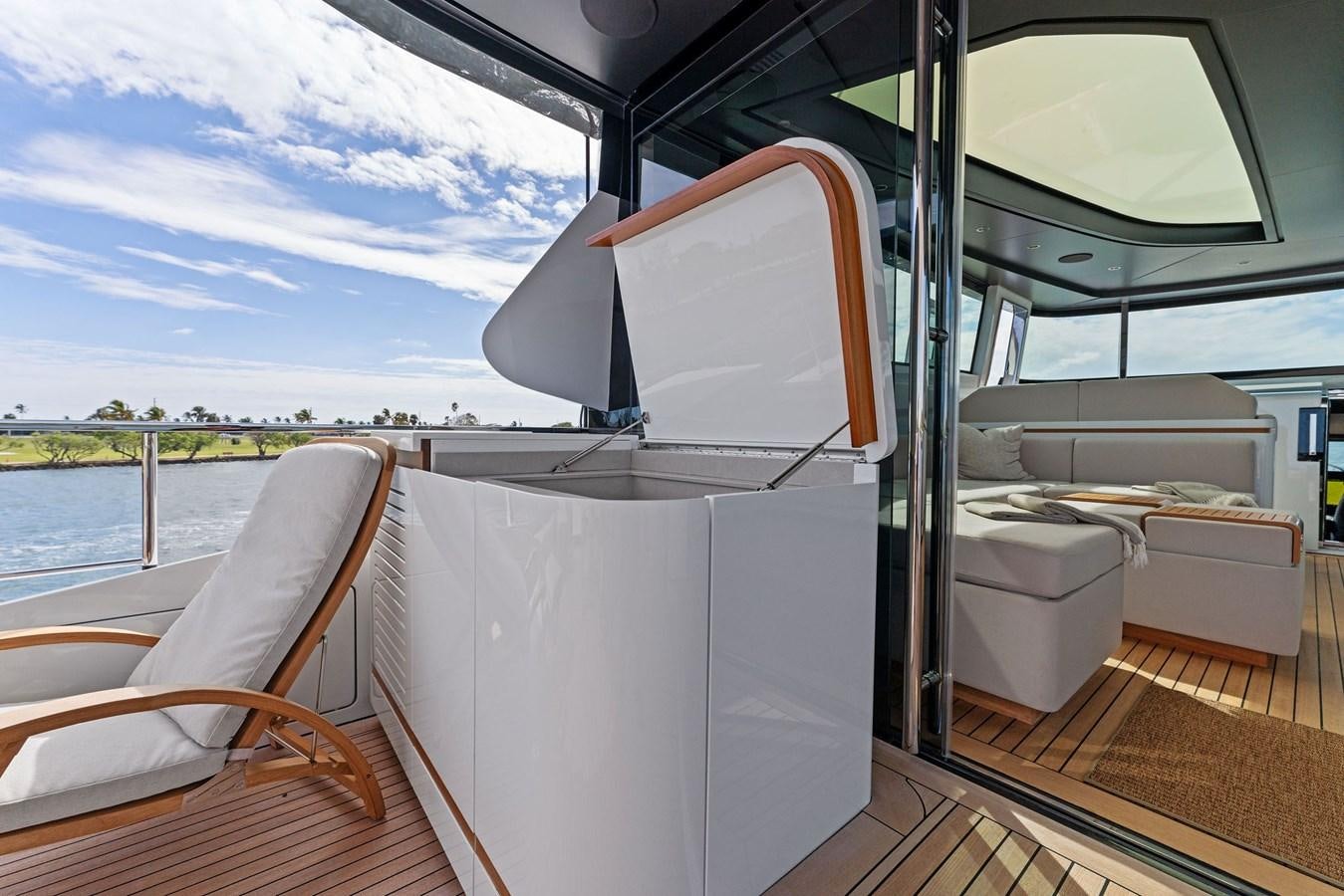 a boat with a canopy aboard LADY K Yacht for Sale