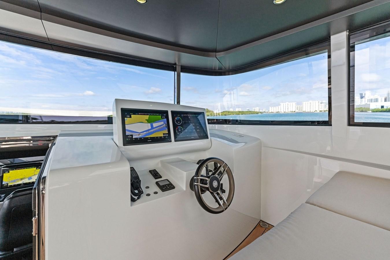 a screen on a vehicle aboard LADY K Yacht for Sale