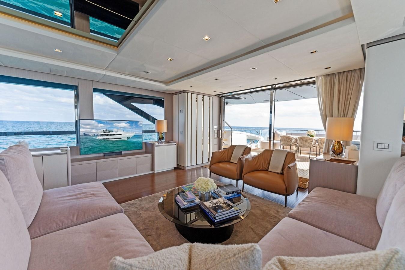a living room with a large window aboard LADY K Yacht for Sale