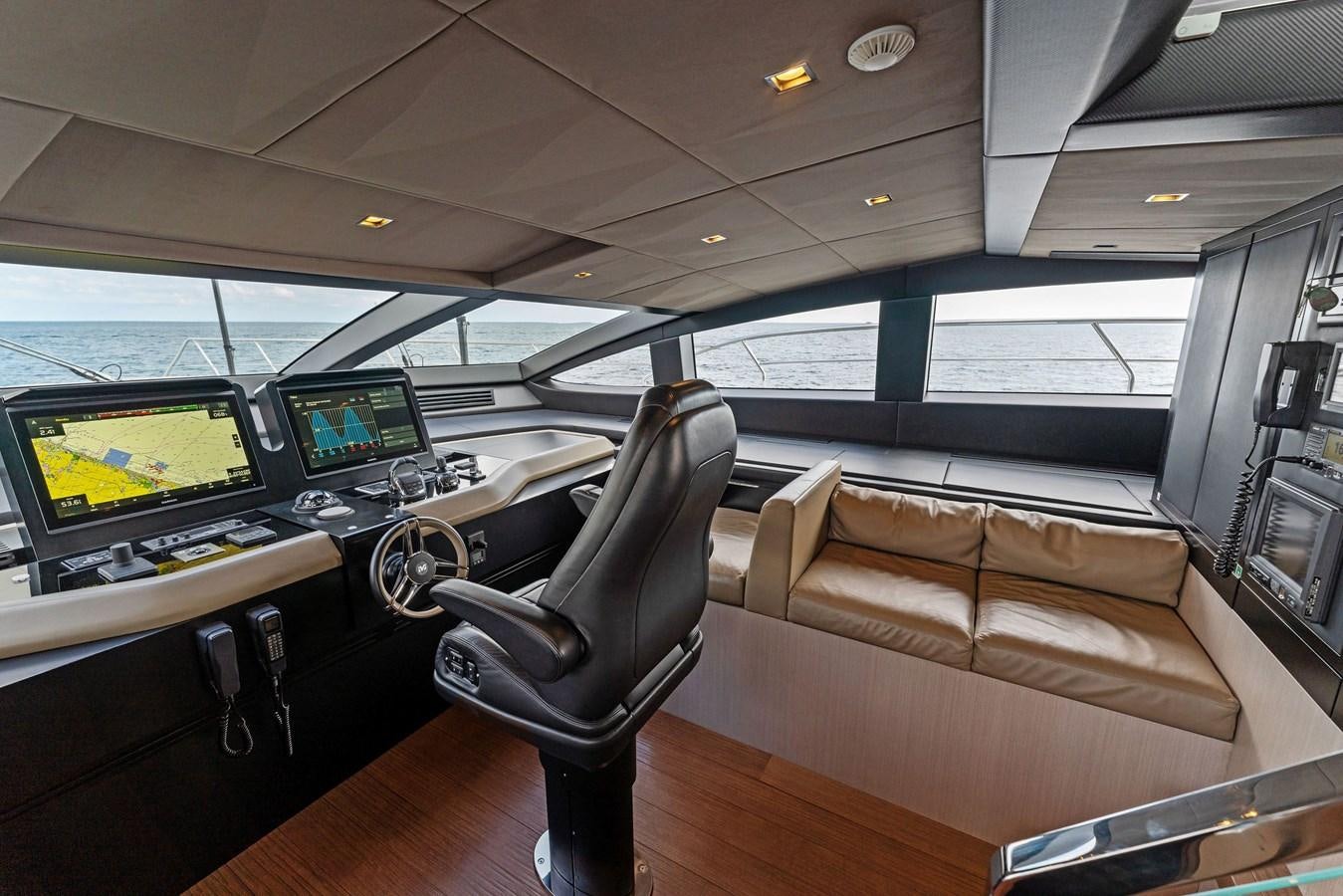 a room with a couch and a chair aboard LADY K Yacht for Sale