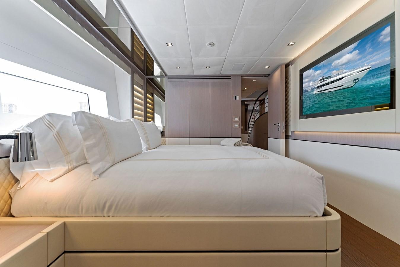 a bed in a room aboard LADY K Yacht for Sale