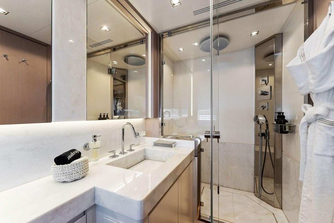 a bathroom with a sink and a mirror aboard LADY K Yacht for Sale
