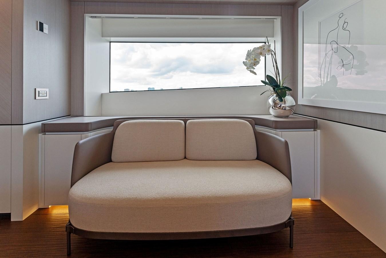a couch in a room aboard LADY K Yacht for Sale