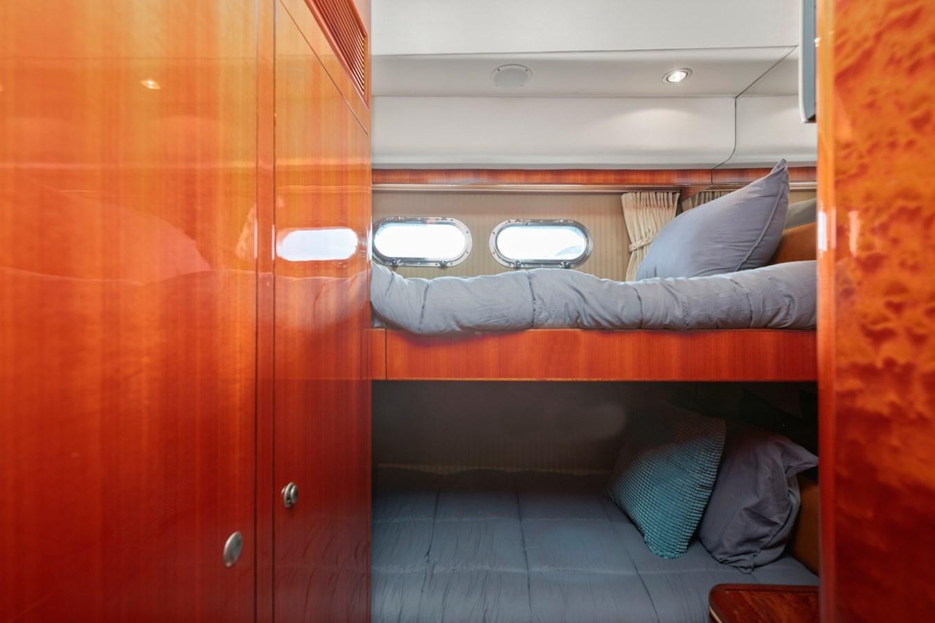 a room with a bed and a window aboard VAMOS A VER Yacht for Sale