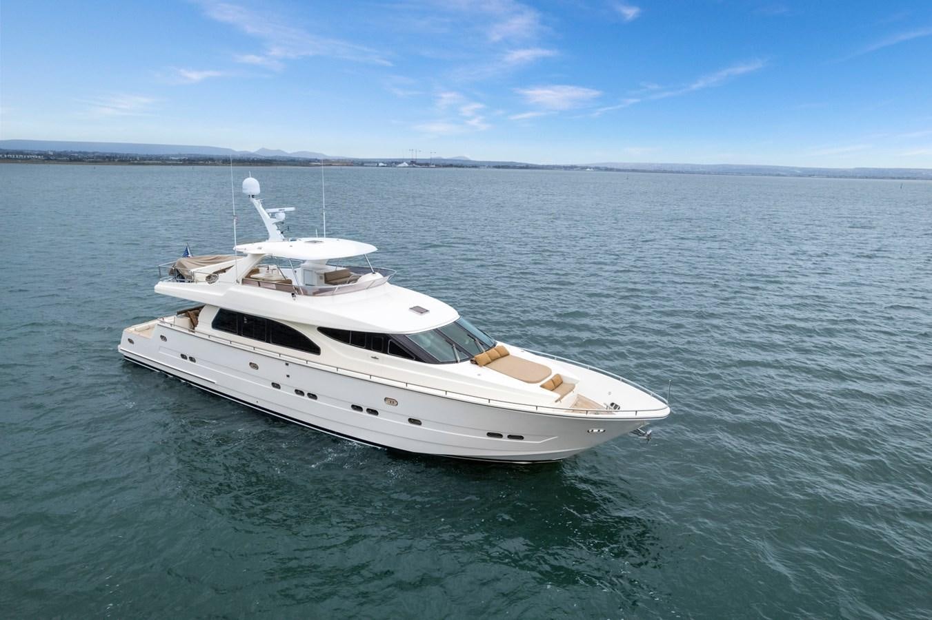 a white yacht in the water aboard VAMOS A VER Yacht for Sale